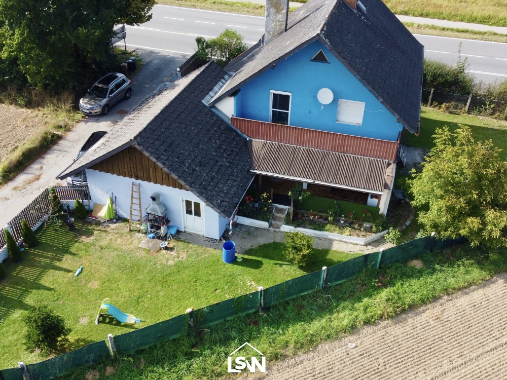 Einfamilienhaus mit Garage und Garten